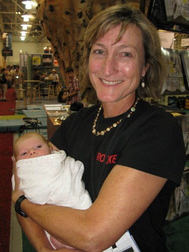Alison Osius holding Stella.  Alison is the Executive Editor of Rock & Ice Magazine and also happened to be the instructor for a beginning rock climbing class I took in 1984. If someone had told me then that 25 years later she would be holding my newborn daughter in a convention center in Salt Lake City, I wouldn't have believed it.