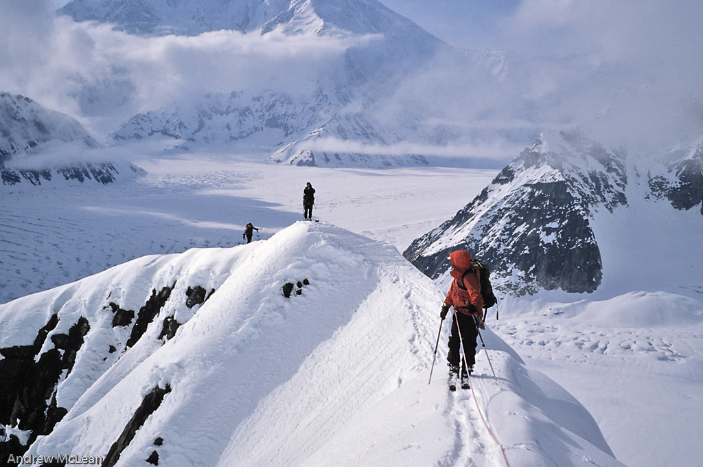 3 skiers on ridge